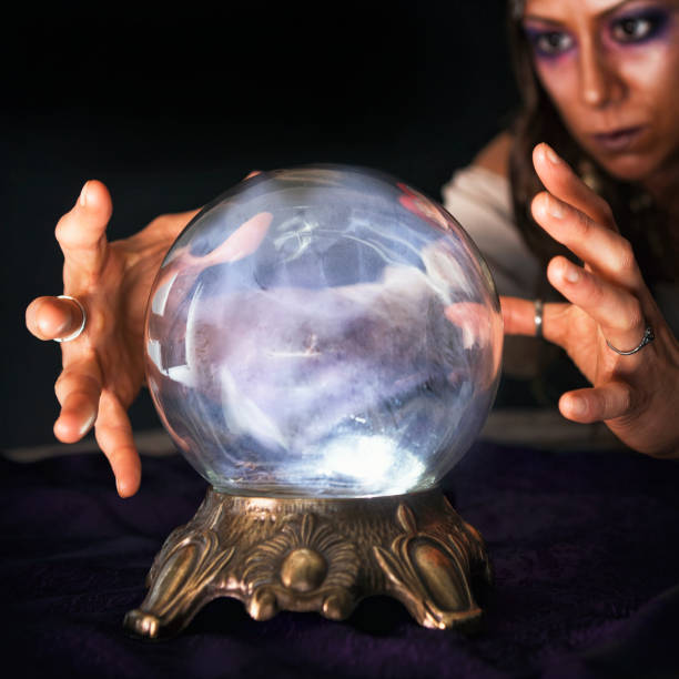 istock Gypsy looking into a Crystal Ball 874639606