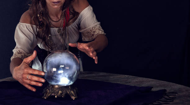 istock Gypsy looking into a Crystal Ball 874639680