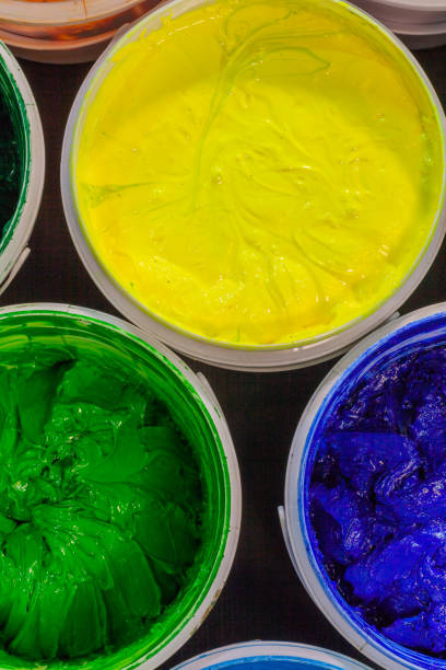 istock top view of Plastisol ink in white plastic cans 874640986