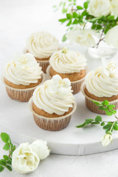 istock delicious vanilla cupcakes with cream cheese frosting 874641174