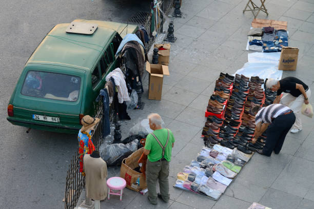 Istanbul, Turkey - August 7: Unknown man trades food in a street near harbor, August 7, 2013 in Istanbul, Turkey. Istanbul is the world's fifth-most-popular tourist destination