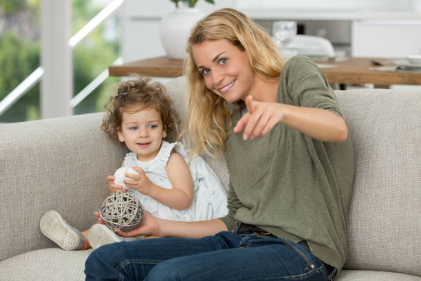 istock mother and daughter playing together 874653344