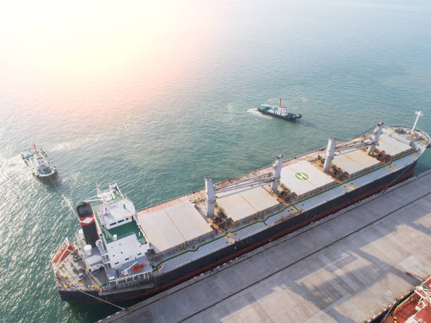 istock top view container ship commercial vessel alongside in port for loading and discharging containers services in maritime transports in World wide logistics 874655996