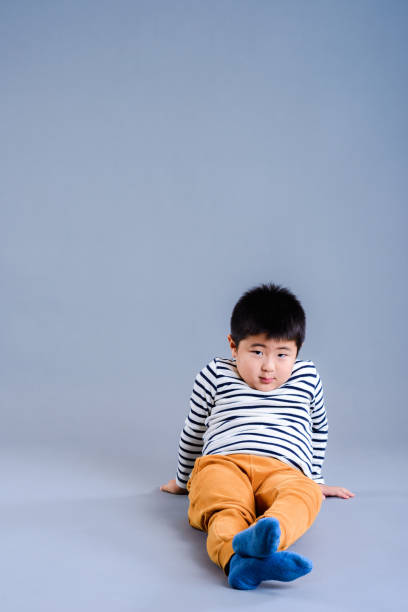 istock japanese child in studio portrait 874676088