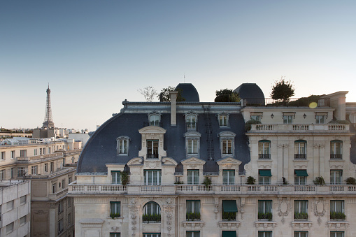 Haussmann buildings with mansard roofs in Paris, France.