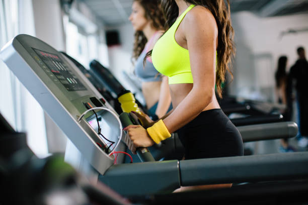 istock Woman at treadmill 874679704
