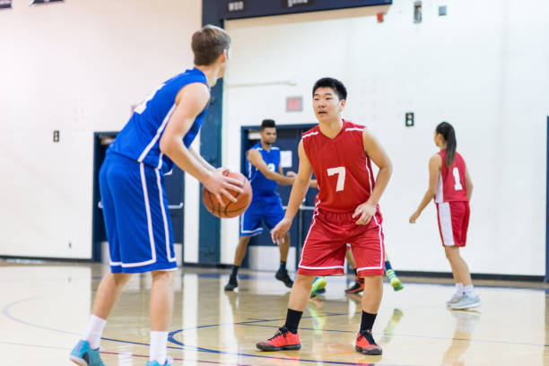 istock High school co-ed basketball game 874682834