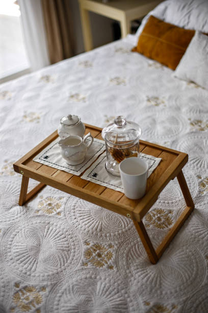 istock Wooden Tray on the Bed 874682916