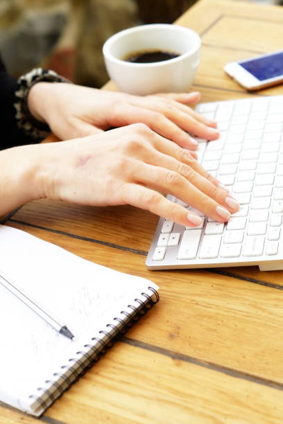 istock Business woman's hands typing on laptop keyboard 874688986