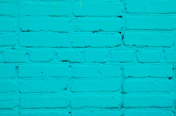 istock brick wall painted wit  color. saturated color. 874697266