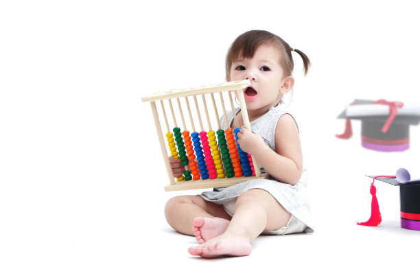 istock The lovely kid playing with abacus 874699786