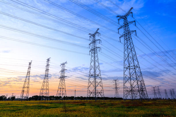 istock High voltage power tower landscape at sunset 874700590