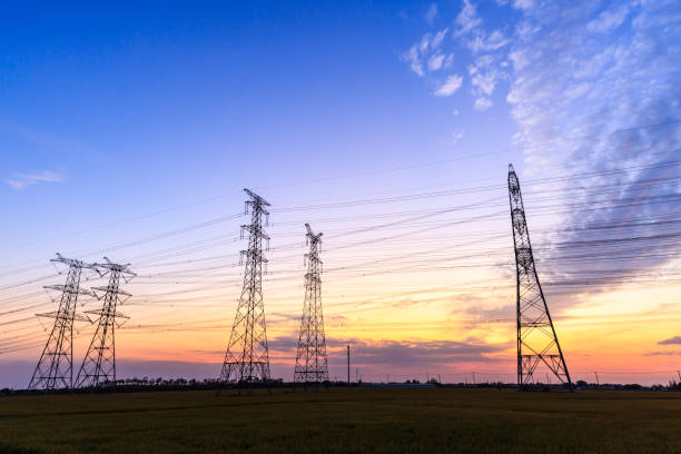 istock High voltage power tower landscape at sunset 874700872