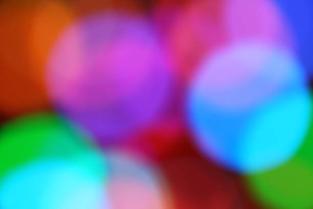 istock Blurry background with bokeh of colorful lighting 874701022