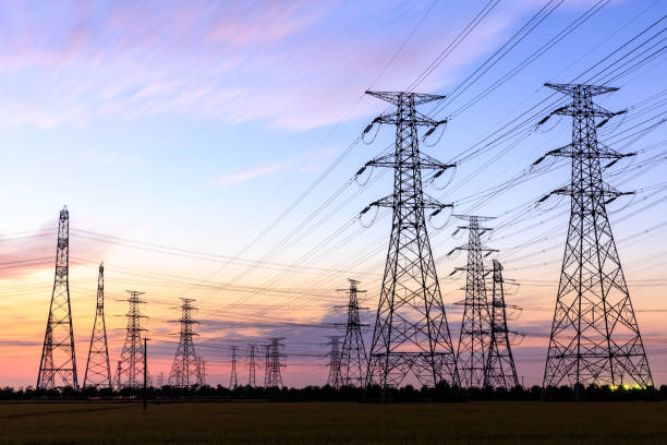 istock High voltage power tower landscape at sunset 874703054