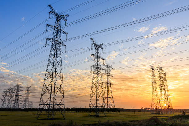 istock High voltage power tower landscape at sunset 874703136