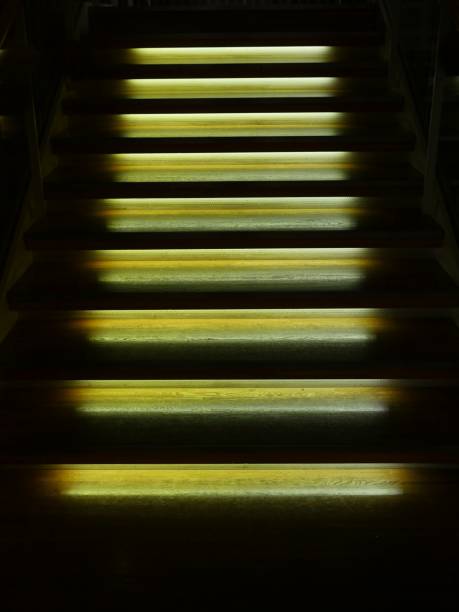 istock Illuminated wooden staircase 874707278
