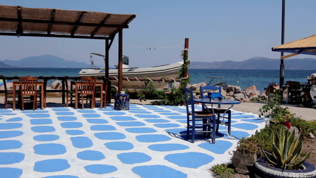 Painted floor as artistic design in a typical outdoor Greek tavern