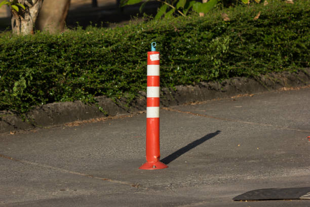 istock Orange traffic pole on road for safety Area 874710530