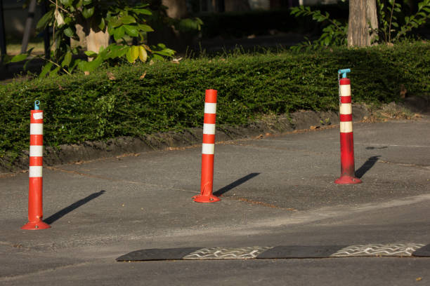 istock Orange traffic pole on road for safety Area 874710532