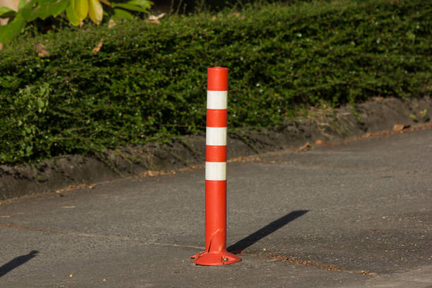 istock Orange traffic pole on road for safety Area 874710534