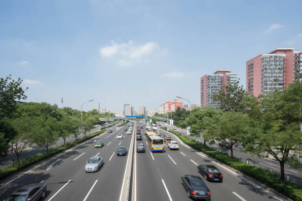istock modern city road and building 874710954