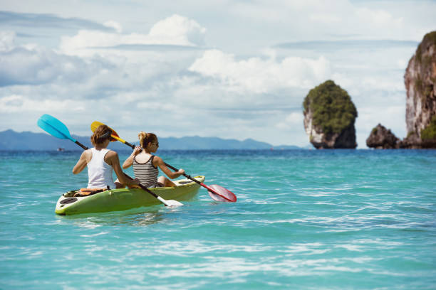 istock Kayaking kayak concept tropical beach 874711562