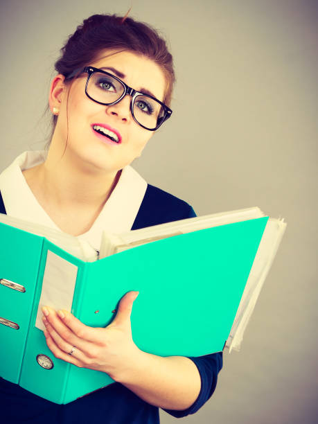 istock Confused business woman playing silly 874711998