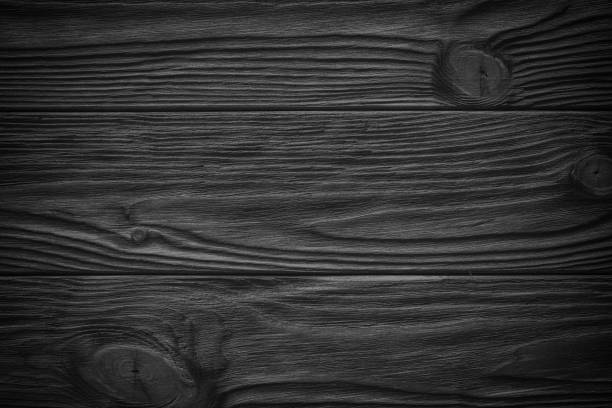 istock Black wooden plank, tabletop, floor surface or chopping, dark wood texture 874712088