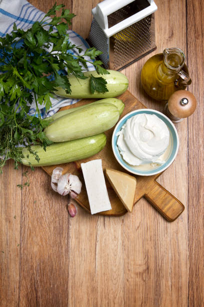 istock Raw zucchini, garlic, greens, three cheeses and olive oil 874714804