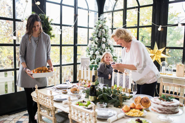 istock Family enjoying preparing Christmas 874719834
