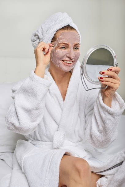 istock Attractive woman wearing a face mask 874728478