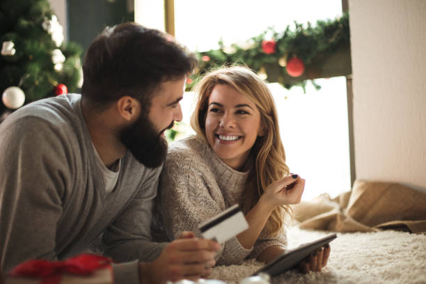 istock Beautiful couple shopping online 874730664