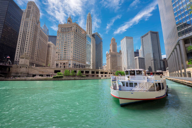Chicago Skyline at sunny day Skyscrapers of Chicago Skyline. Chicago downtown and Chicago River with tourit ship during sunny day, Illinois, USA. lake michigan photos stock pictures, royalty-free photos & images