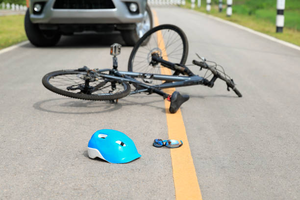 istock Accident car crash with bicycle on road 874735480
