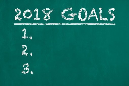2018 goals list written on green chalkboard