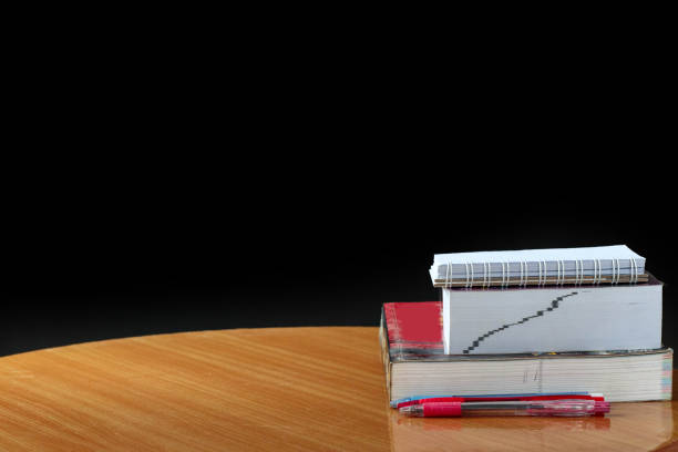 istock Education concept,book and pen on wood table 874744896