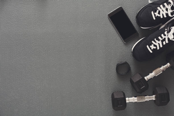 istock Fitness background, sport equipment, copy space 874752100