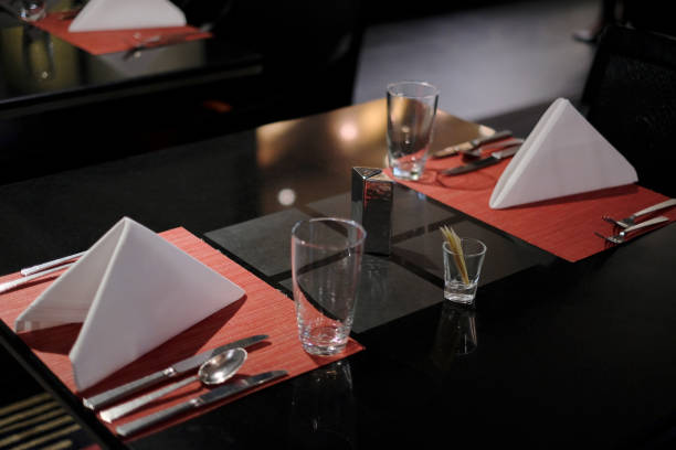 istock Place setting in an expensive haute cuisine restaurant 874759000