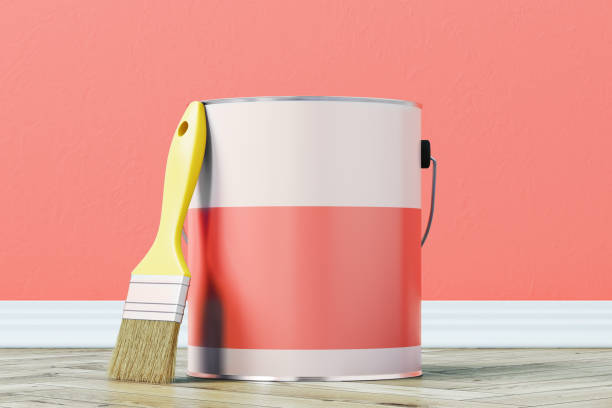 istock Red paint bucket and a brush 874761136