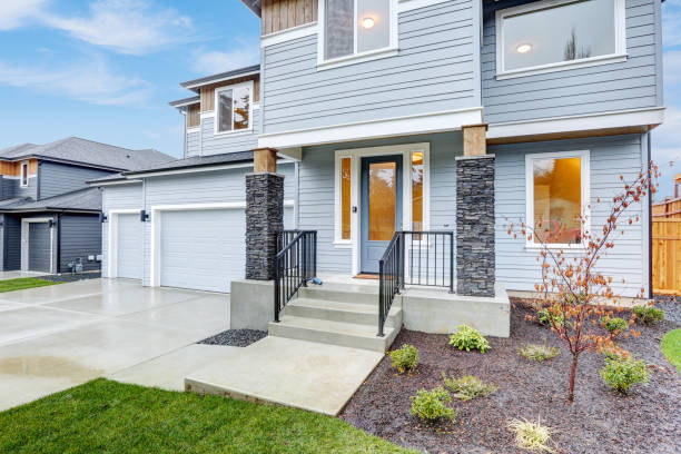 istock Hew luxury home exterior featuring three Car Garages, 874761204