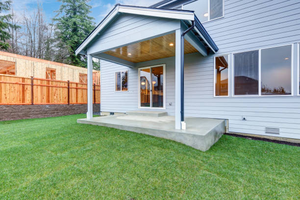 istock New luxury home with covered back porch 874761270