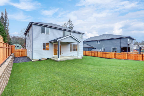 istock New luxury home with covered back porch 874761516