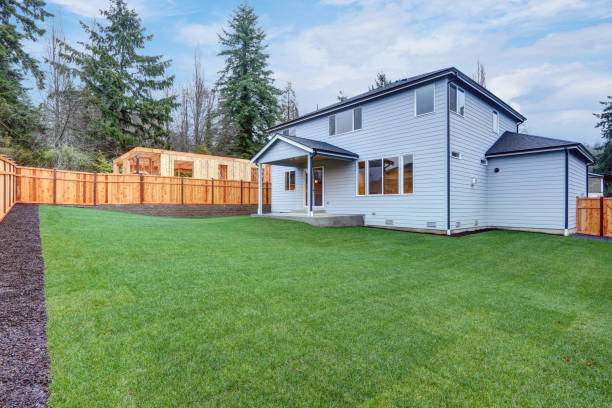 istock New luxury home with covered back porch 874764716