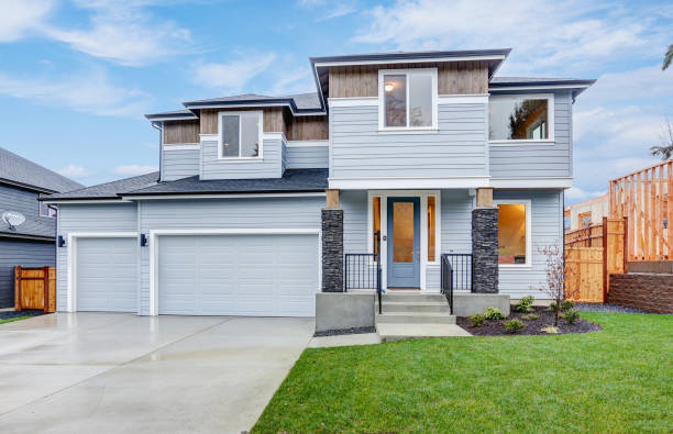 istock Hew luxury home exterior featuring three Car Garages, 874764854