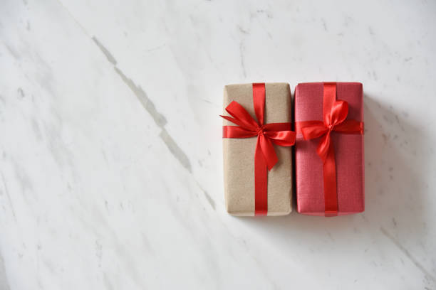 istock Close up Top view of Brown and red gift boxes. 874765030