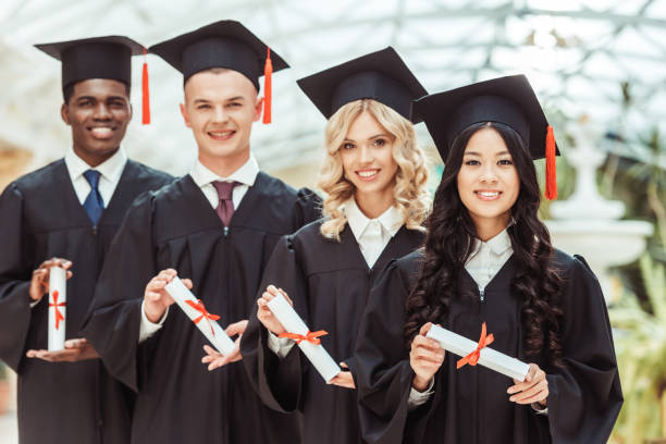istock group of multiethnic students with diplomas 874768336