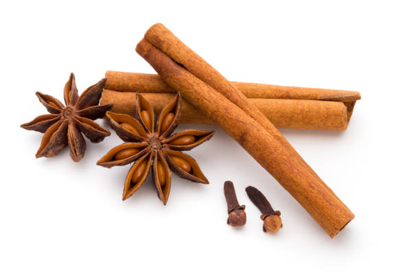 istock Cloves, anise and cinnamon isolated on white background. 874771914