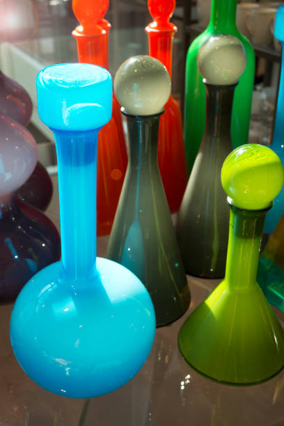 istock Colorful glass bottles and carafes 874772790