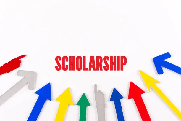 Photo of Colorful Arrows Showing to Center with a word SCHOLARSHIP